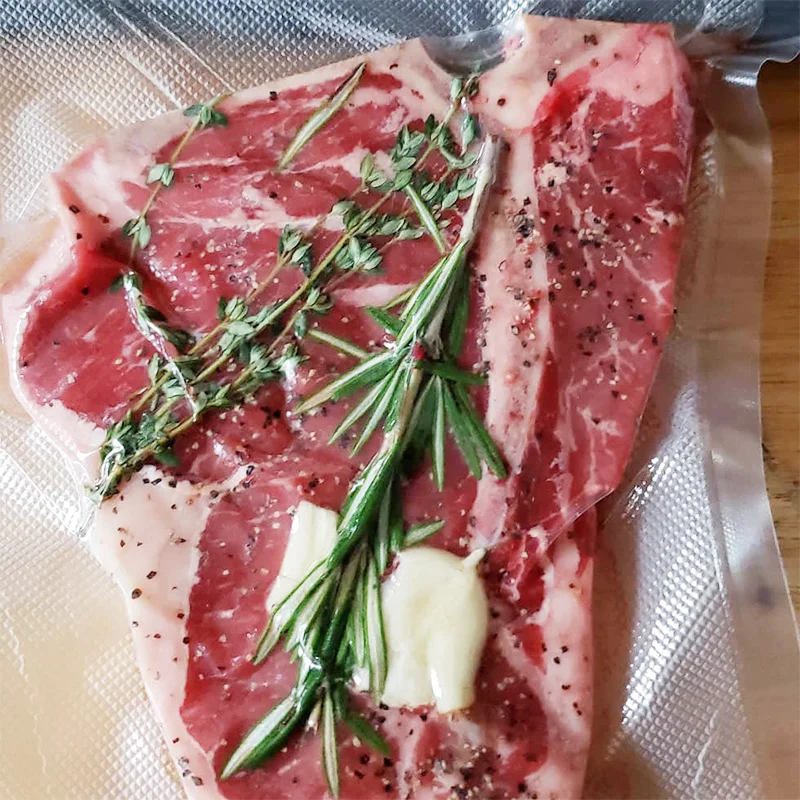 Food Grade heat seal Transparent Nylon Laminated Pe Vacuum Bag plastic food packaging bag for salmon packaging