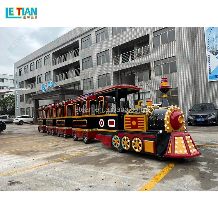 Outdoor public playground backyard kids locomotive train rides commercial shopping mall tourist trackless train