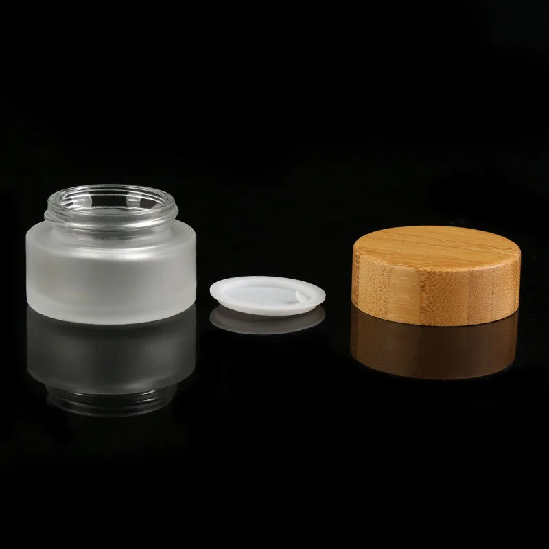 Round 50g wooden bamboo packaging covers empty pot cosmetic glass jars manufacturer glass jar bamboo lid