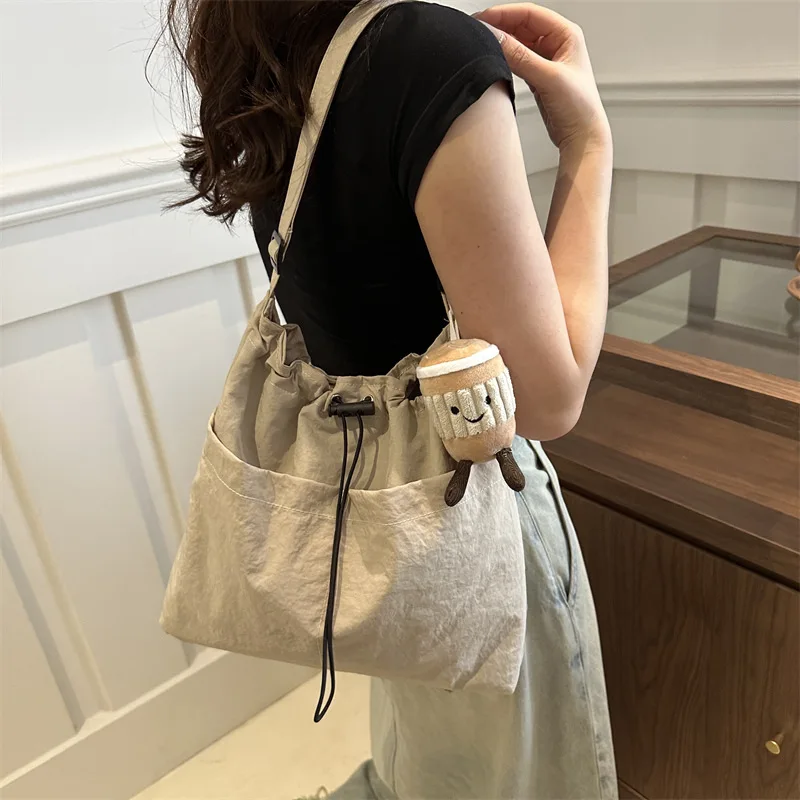 Japanese Style Ins Street Leisure Female Crossbody Shoulder Bag With Drawstring Opening Solid Color Bucket Shape Messenger Bag