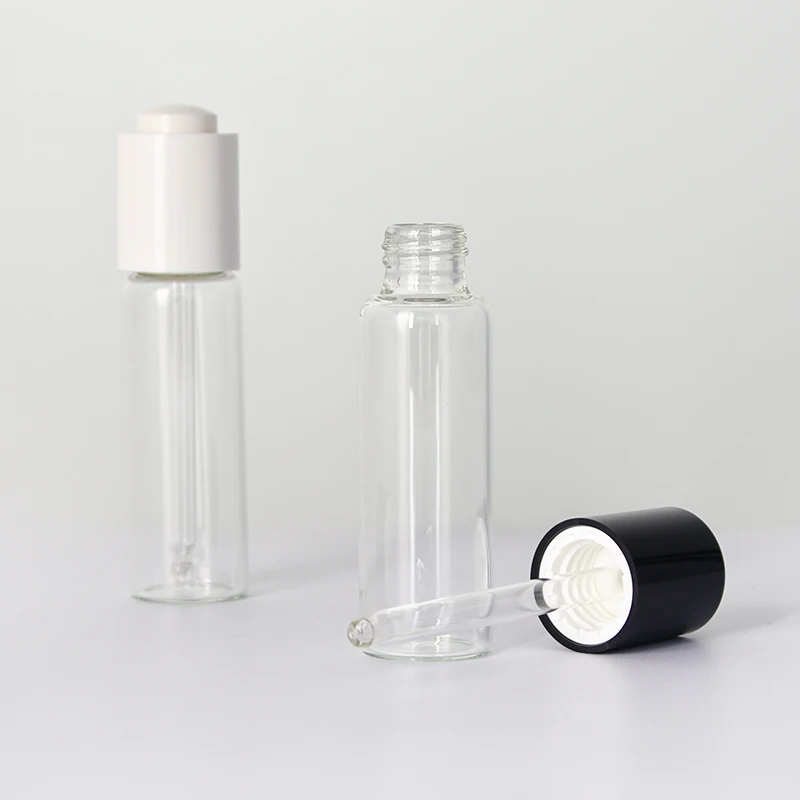 Transparent Skincare Packaging Glass Essential Oil Bottle with White Pressing Dropper