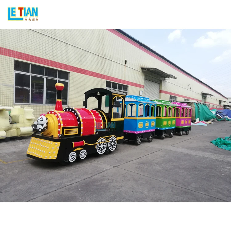 Attractive outdoor playground tourist train prices amusement park kids trackless train rides for sale