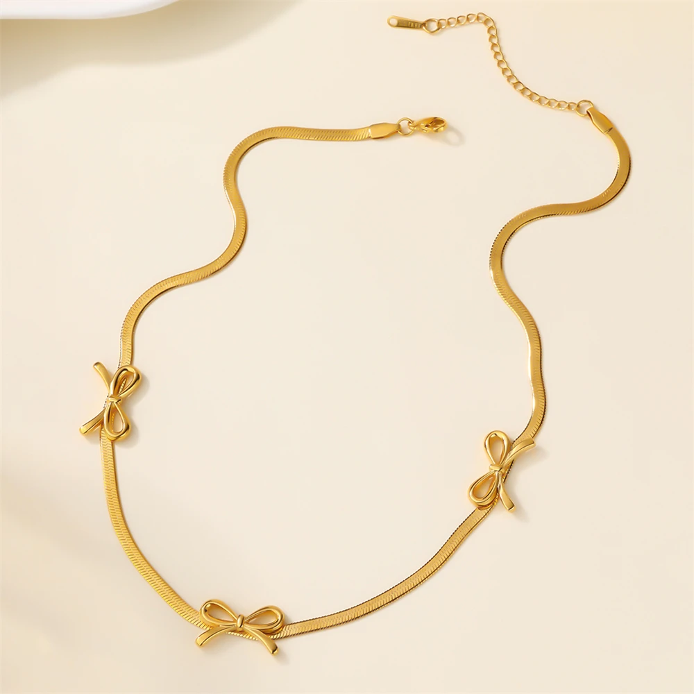 Sweat Resistant 316L Stainless Steel Snake Bone Non Fading 18K Gold PVD Coating Polished Bowknots Decorated Blade Chain Necklace