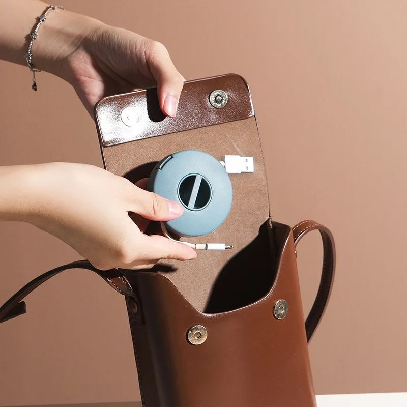 Rotatable Earphone Winder Charger Wire Storage Box with Mobile Phone Data Cable