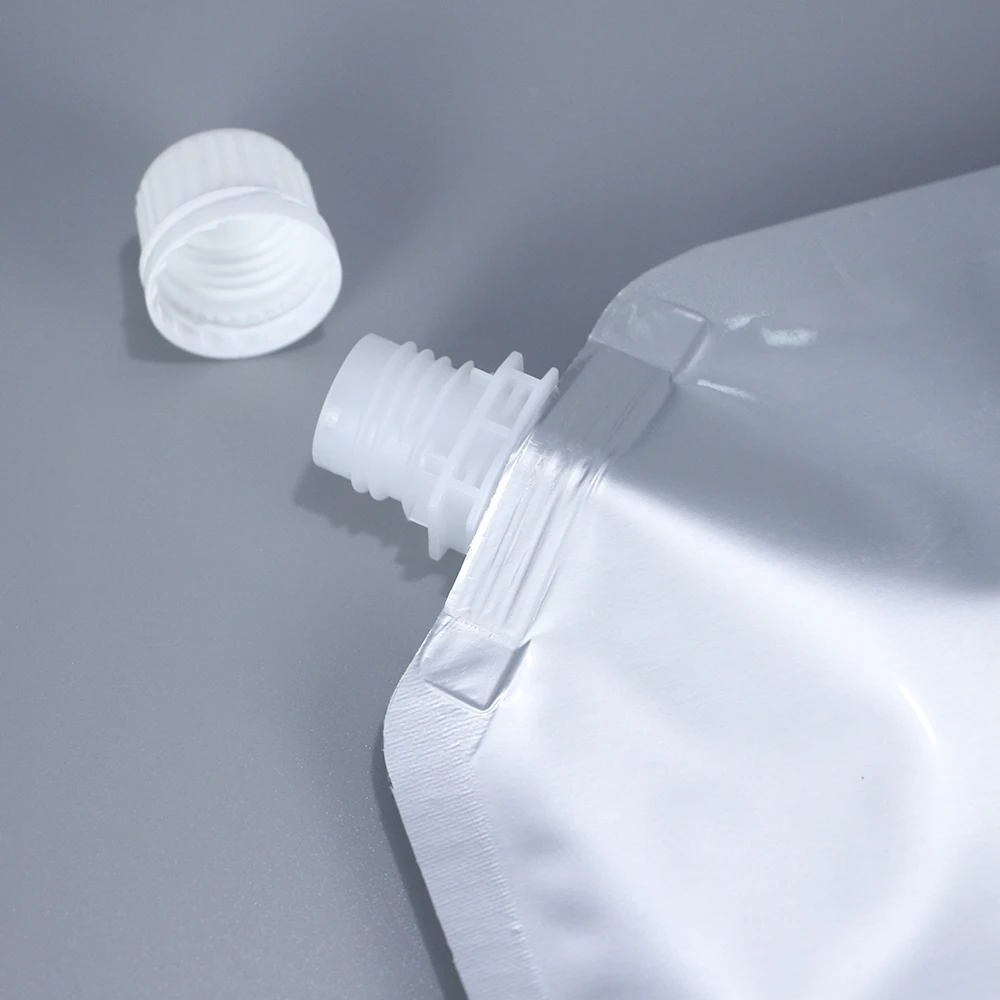 Wholesales stand up pouch plastic aluminum foil nozzle packaging bags with spout for water juice wine tea coffee packaging