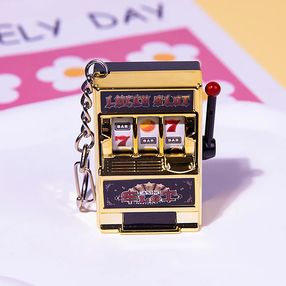 Cheap Game Winning Best Friend Gift Toy Key Holder Coin Games Console Creative Slot Retro Mini Fruit Machine Keychain