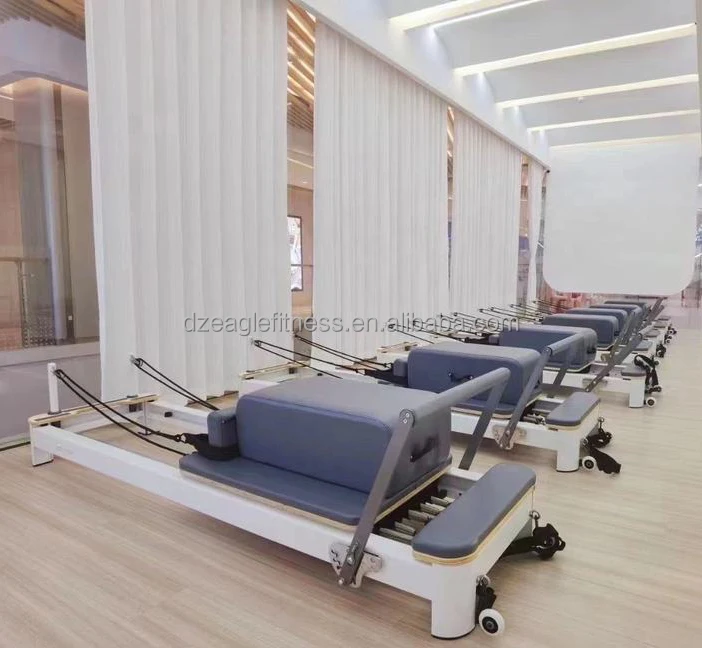 Hot Sale Moving Footbar Small White Aluminum Alloy Core Bed Newest Equipment Machine Pilates Reformer With Jump Board