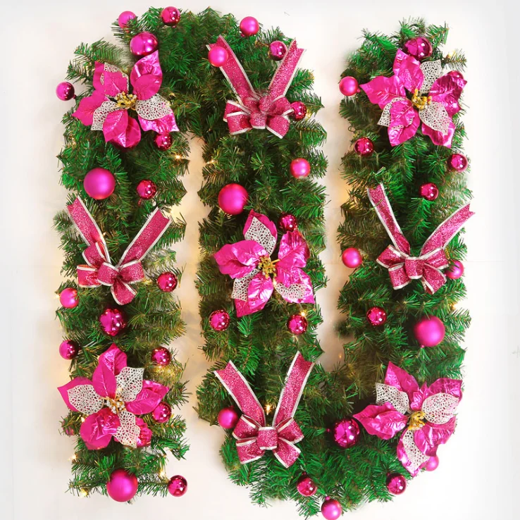 Wholesale Christmas flower bowknot decorated led pre lit artificial christmas garland