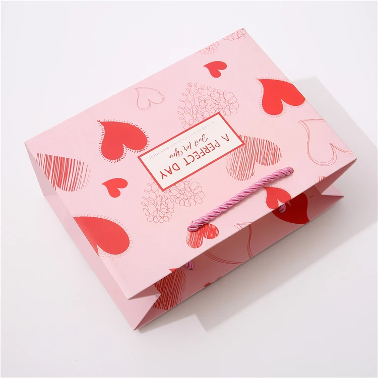 Gonhua Wholesale Luxury Gold Foil Pink Kraft Packing Paper Bag With Ribbons Custom Logo Gift Printed Shopping Bag