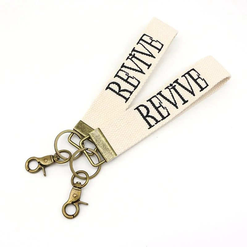 Cream Custom Circle Jet Tag Canvas Fabric Open Wristlet Key chains Key Fobs Embroidery Keychain