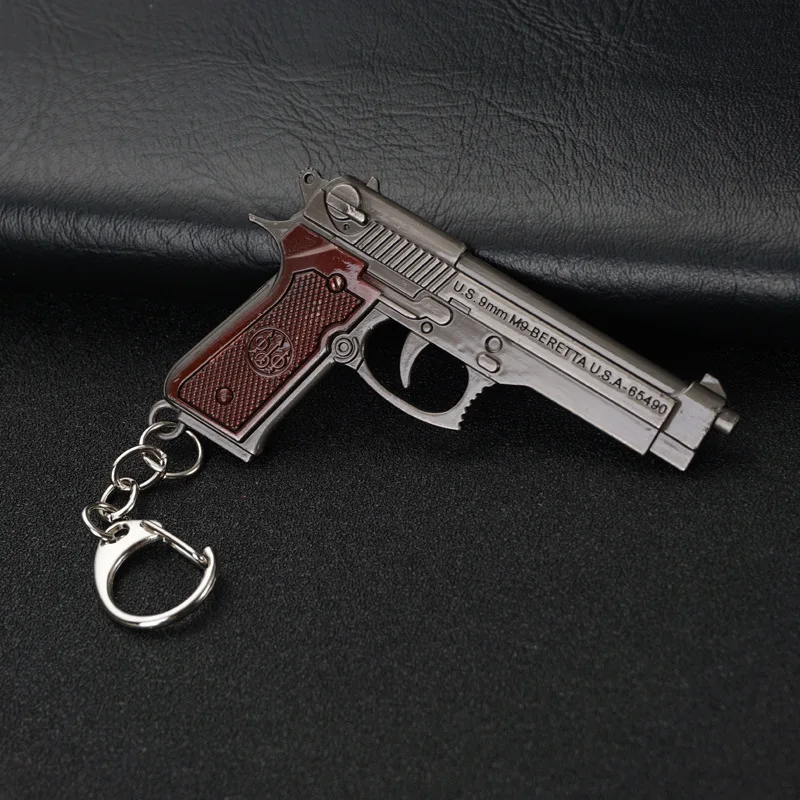 2022 Popular game cool handgun decoration Cross fire metal Mini Pistol shape Key Ring metal gun keychain for bag