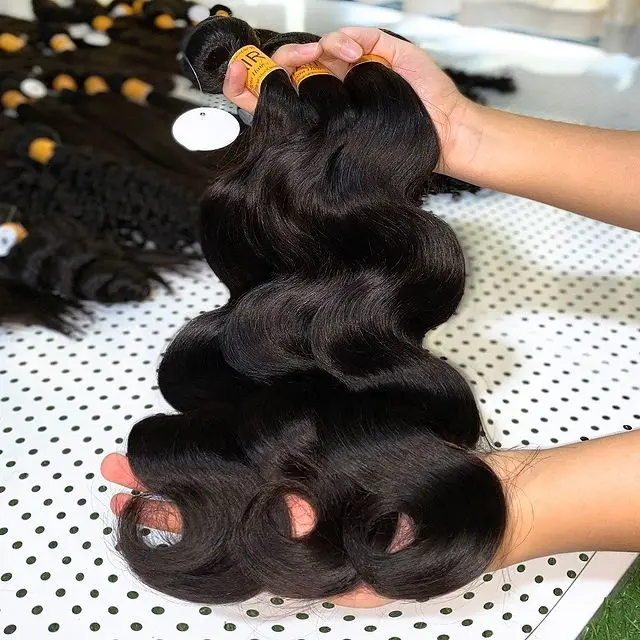 Guangzhou hair factory raw peruvian virgin hair,40 inch virgin peruvian human hair bundles,remy hair peruvian human hair dubai
