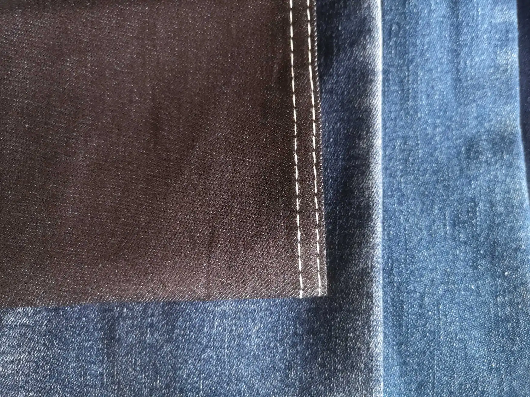 2549 Soft OE Foshan denim manufacturer raw material bull woven twill high stretch denim fabric for shiny jeans