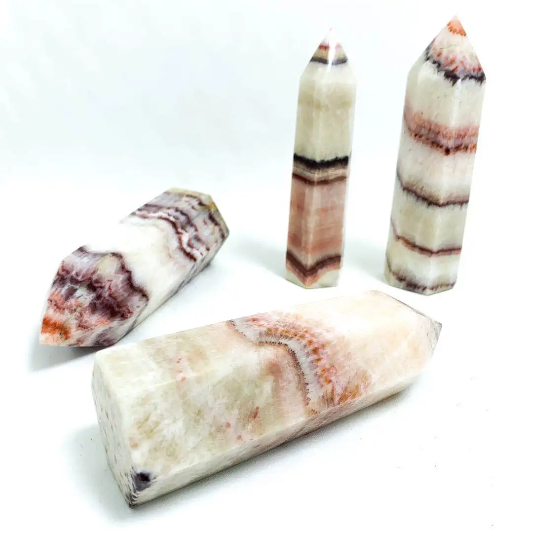 Wholesale price of cheap natural hand-carved pork stone crystal pillar pork stone healing rod