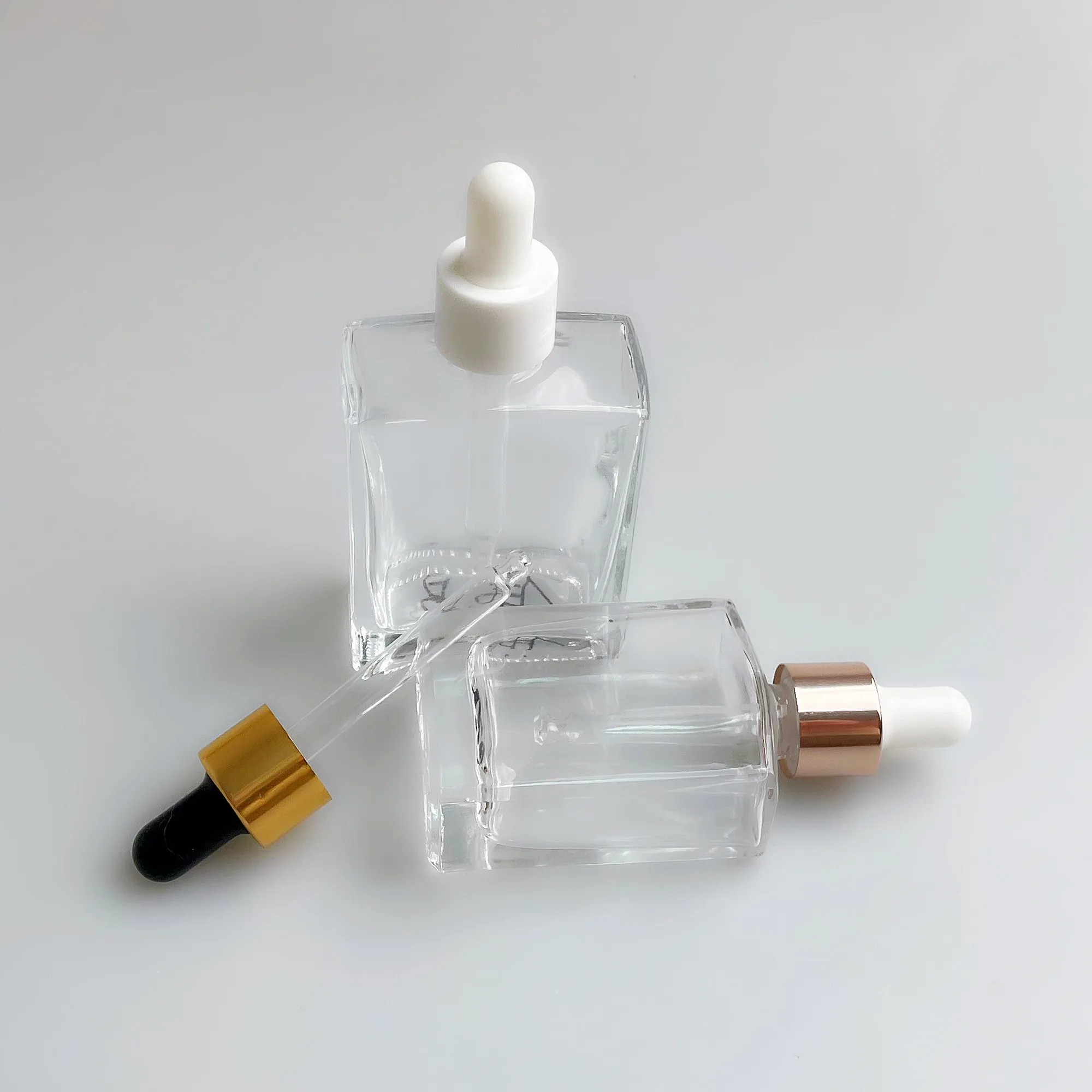 square shoulder dropper bottle new design perfumes square glass dropper bottle clear glass with dropper