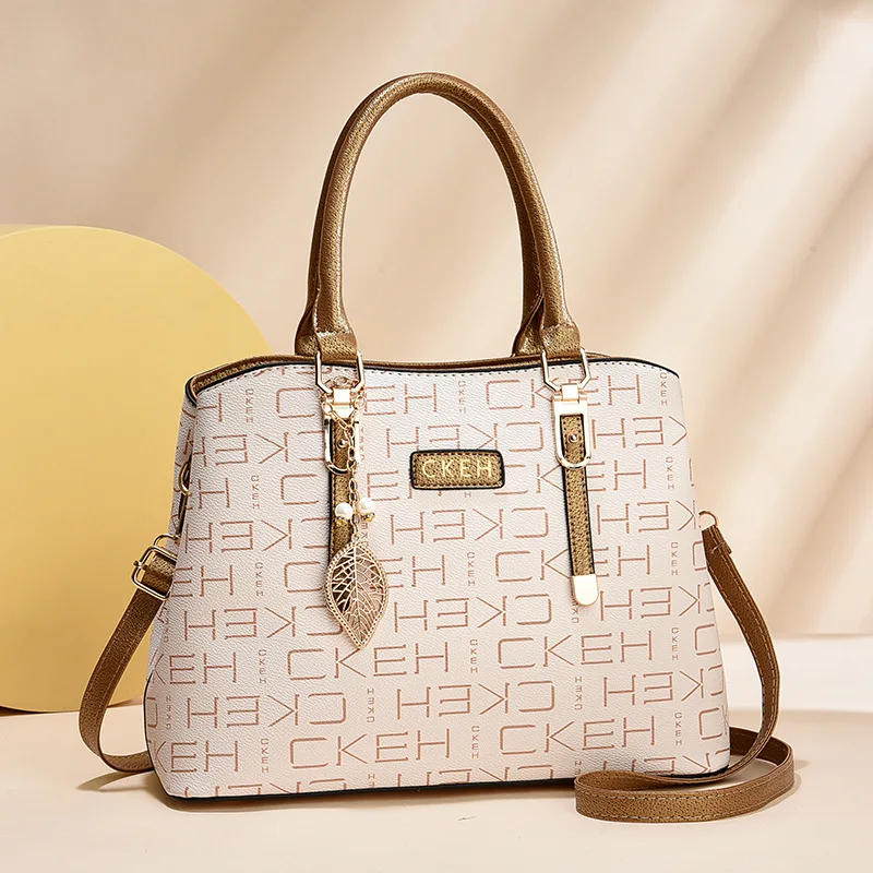 2024 Women luxury designer Pu leather Top-handle handbags Alphabetic printing large capacity vintage mom tote bag