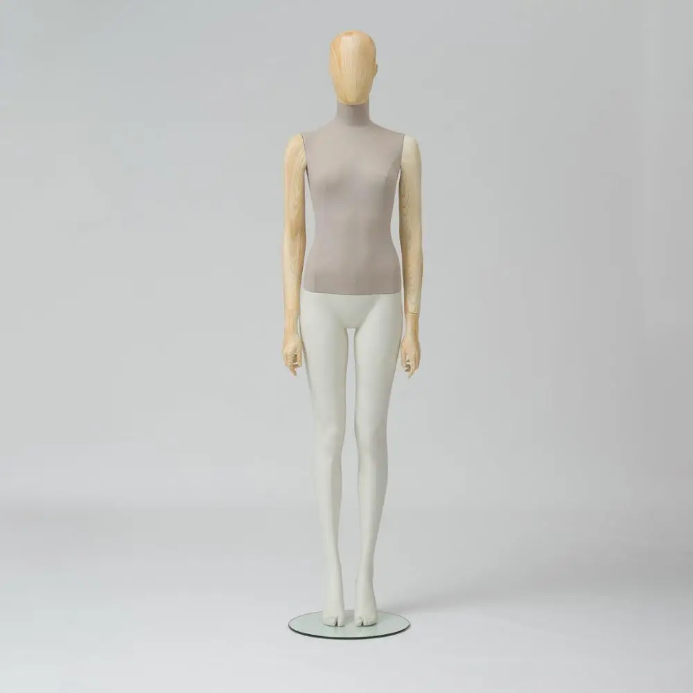 
Female mannequin with egg head in fabric 