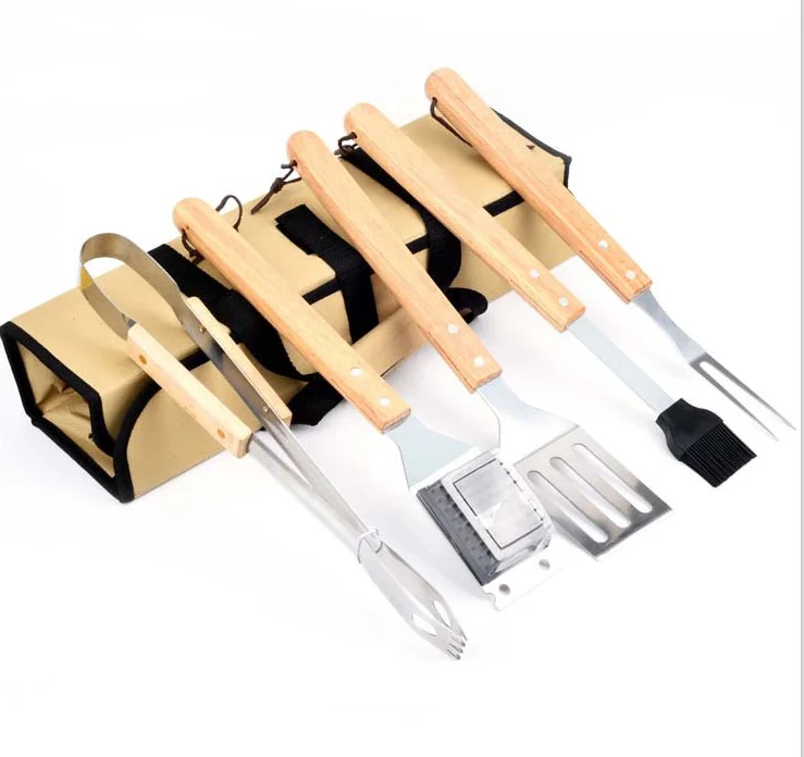 New Stainless Steel 5 piece set of cloth bag barbecue tools to carry outdoors With Wooden Handles