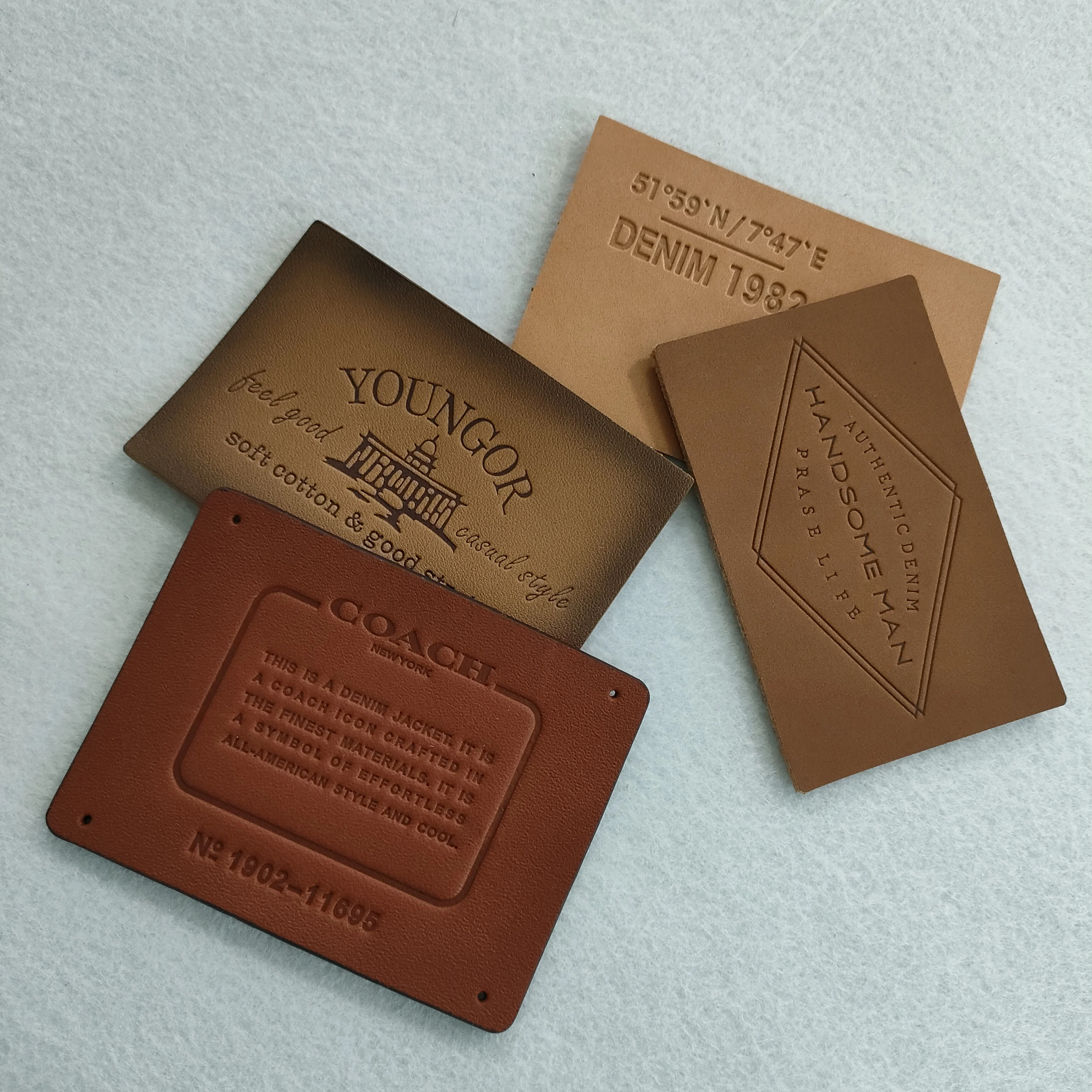 Wholesale real manufacturer free sample leather embossed LOGO denim leather label patch