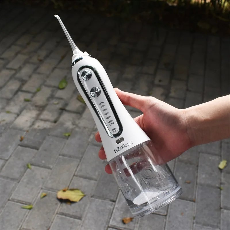 8 Years factory oem ipx 7 waterproof portable dental water jet teeth water flosser oral irrigator for home commercial travel use