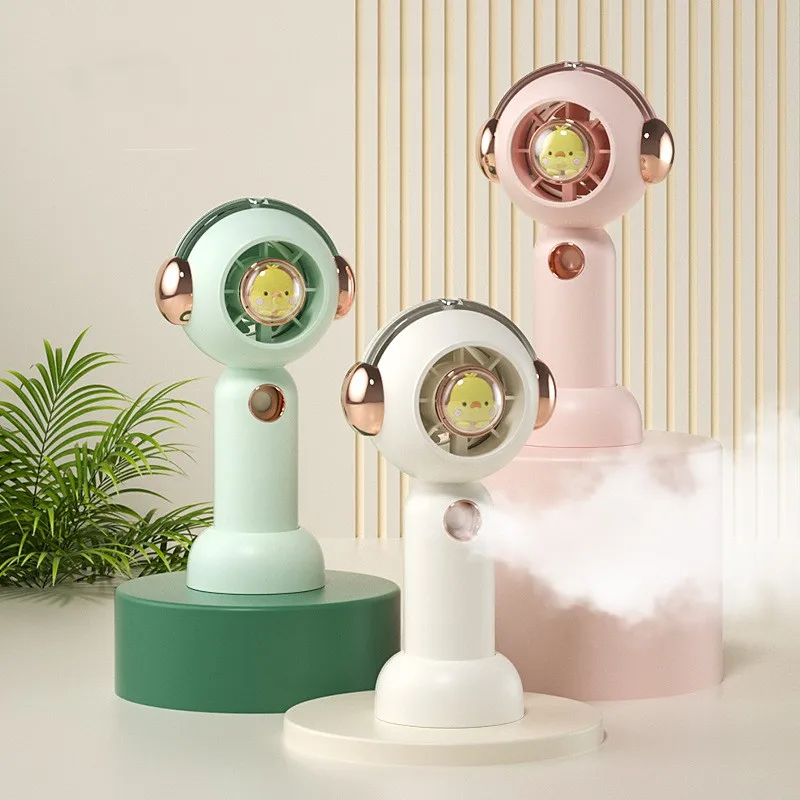 New handheld fan spray cooling fan portable mini student cartoon cute electric fan USB