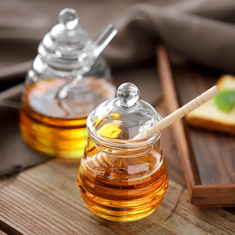 Wholesale household high borosilicate glass honey jar with lid glass stirring stick Honey bottle Creative glass transparent jar