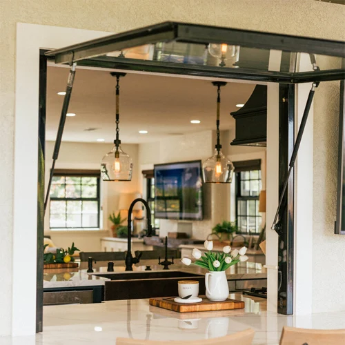 Kitchen servery awning window with gas strut