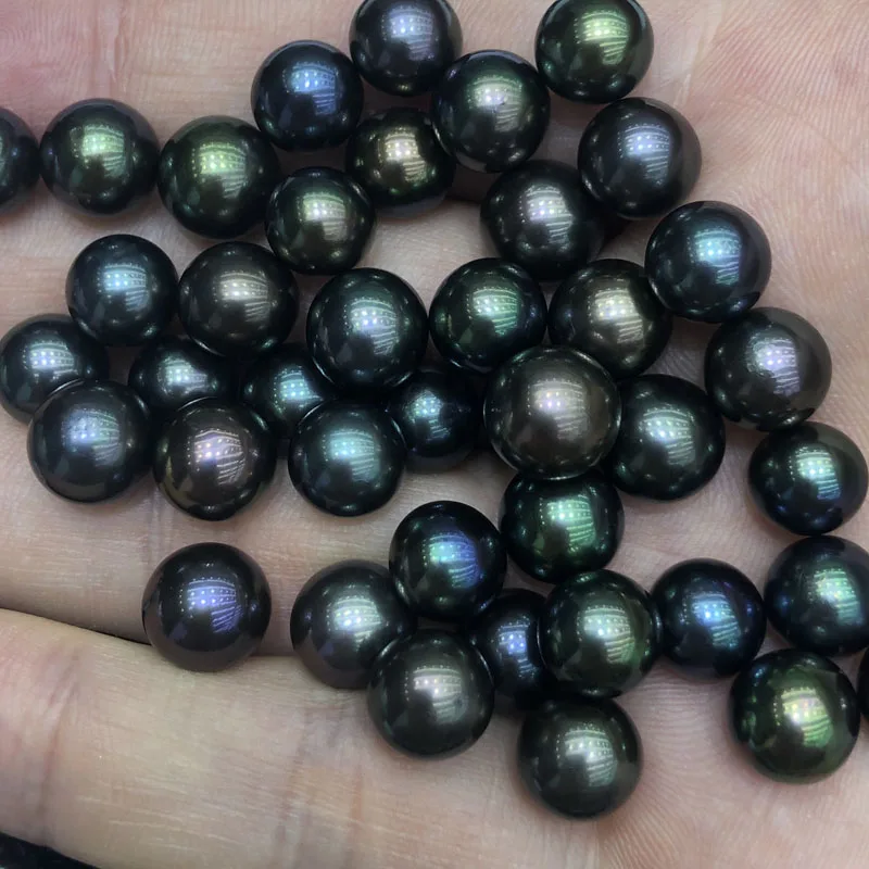 
wholesale dyed freshwater black pearls 9-10mm,unique peacock color,real size 8.4-9.4mm,high quality,round shape,clean surface 