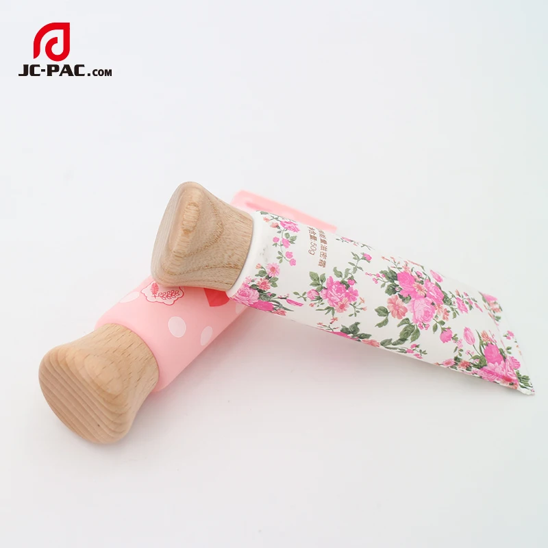 
Clear Plastic Skin Care Packaging Manufacturer Tube With Wooden Grain Screw Lid 60ml 80ml 100ml 