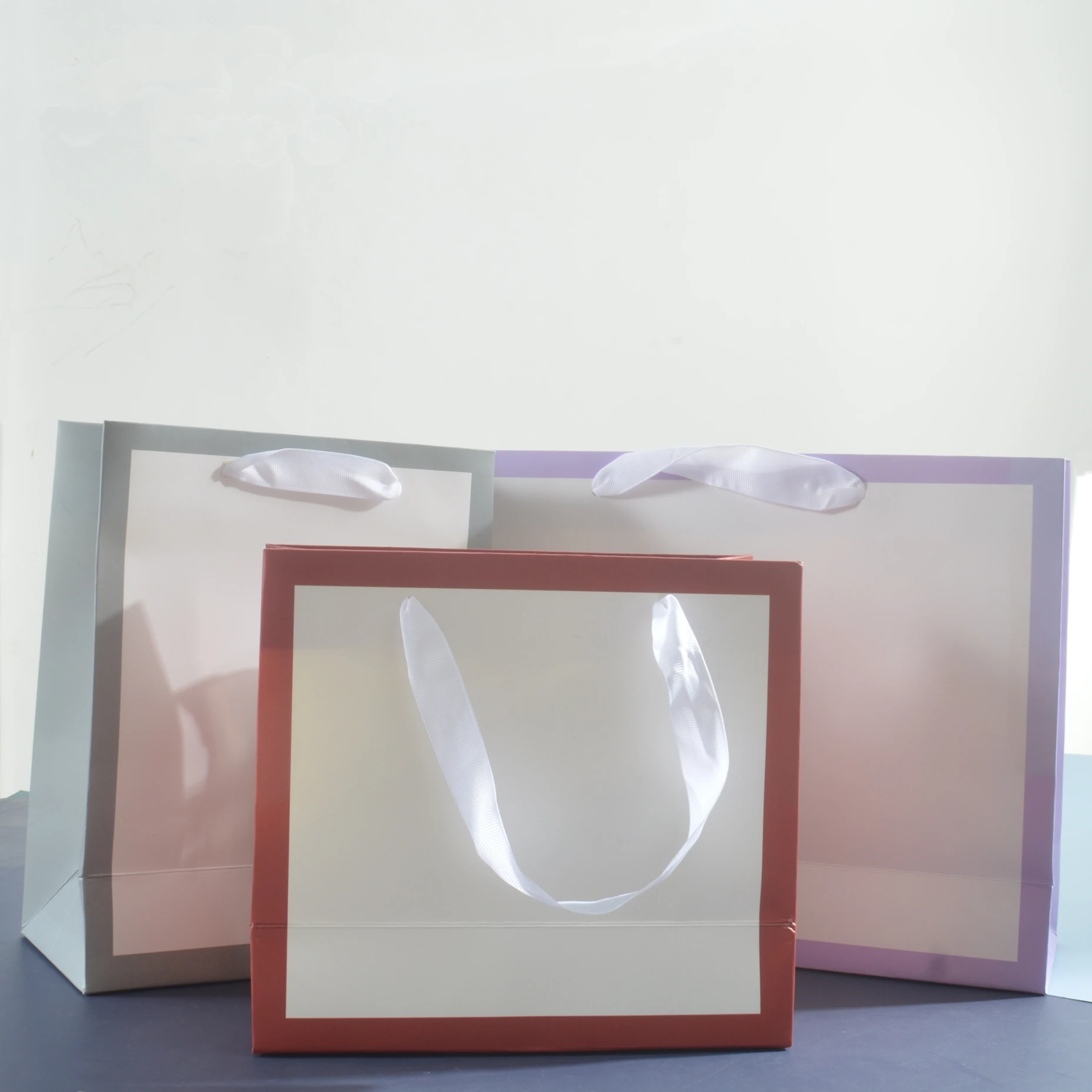 Custom Luxury Clothes Store Retail Packaging Gift Carry Bags Boutique Shopping Paper Bags With Your Own Logo