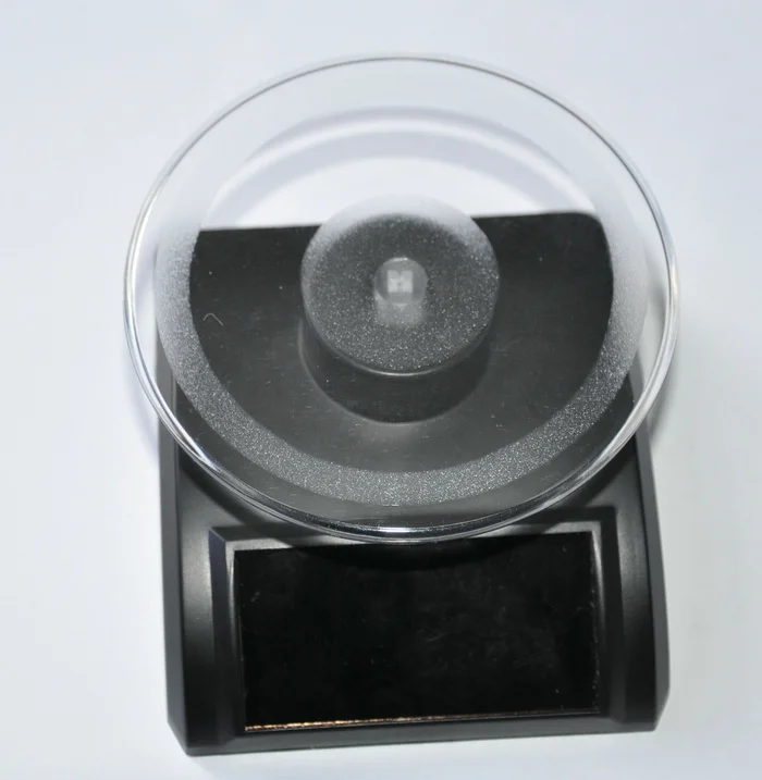 Free Technic Support solar watch display shelf solar acrylic display/lipstick display/round rotating solar power tools solar toy