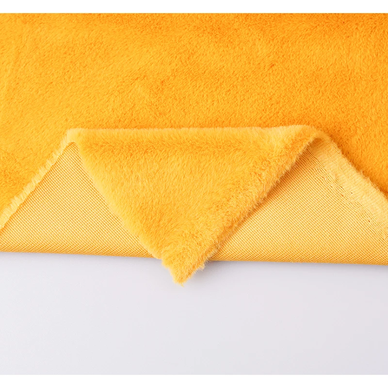Wholesale 100% Polyester Knit Lining Long Pile Tissavel Faux Rabbit Fur Fabric Fluffy Imitation Rabbit Fur