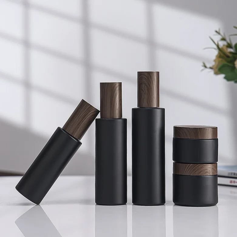 Wholesale 20g 30g 50g 80g 100g Cream Matte Black Glass Jar with New Wood Grain Cover Facial Cream Bottle