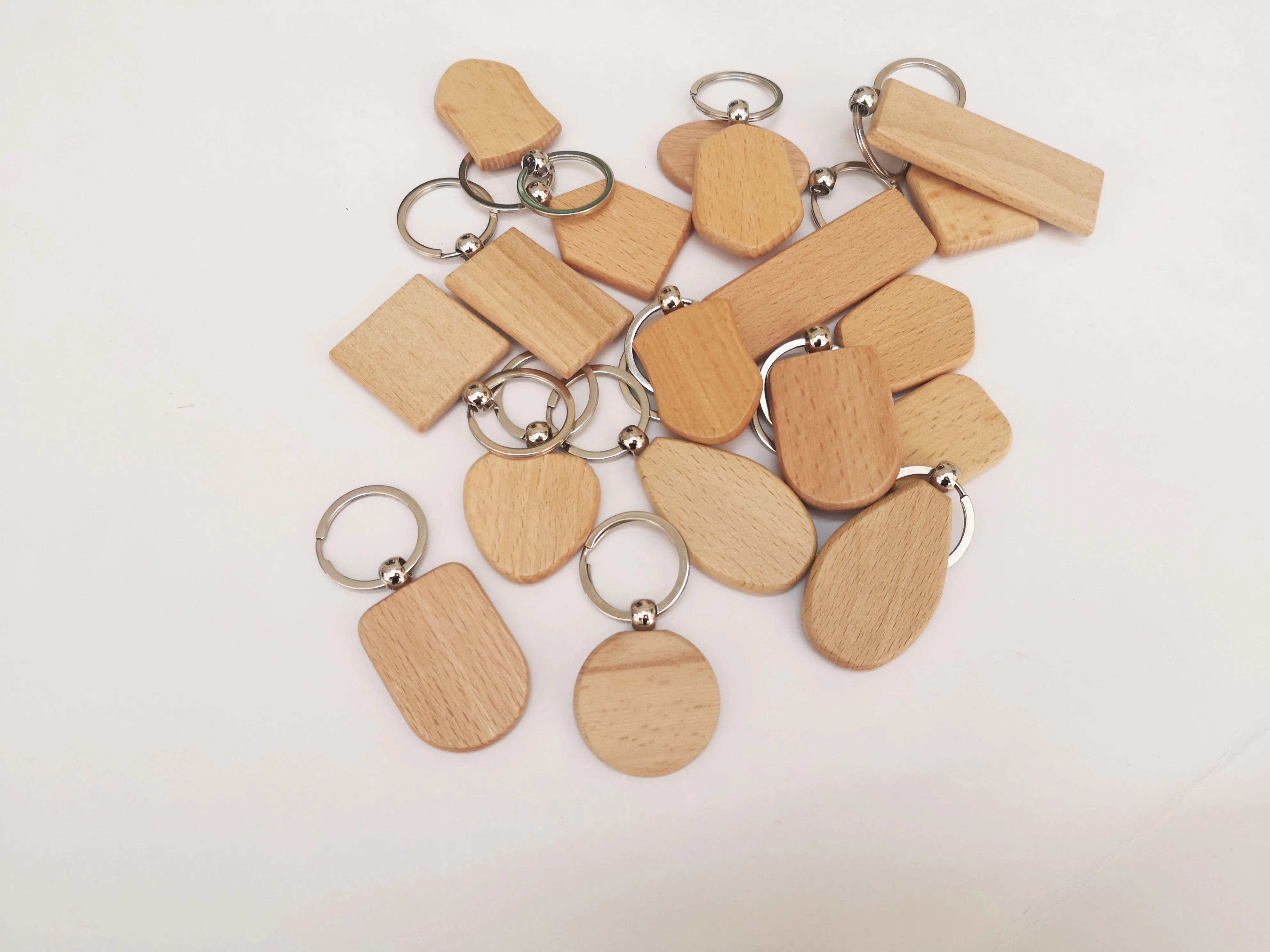No MOQ DIY blank beech wood key ring, customized laser/printing  LOGO geometric wooden carving keychain