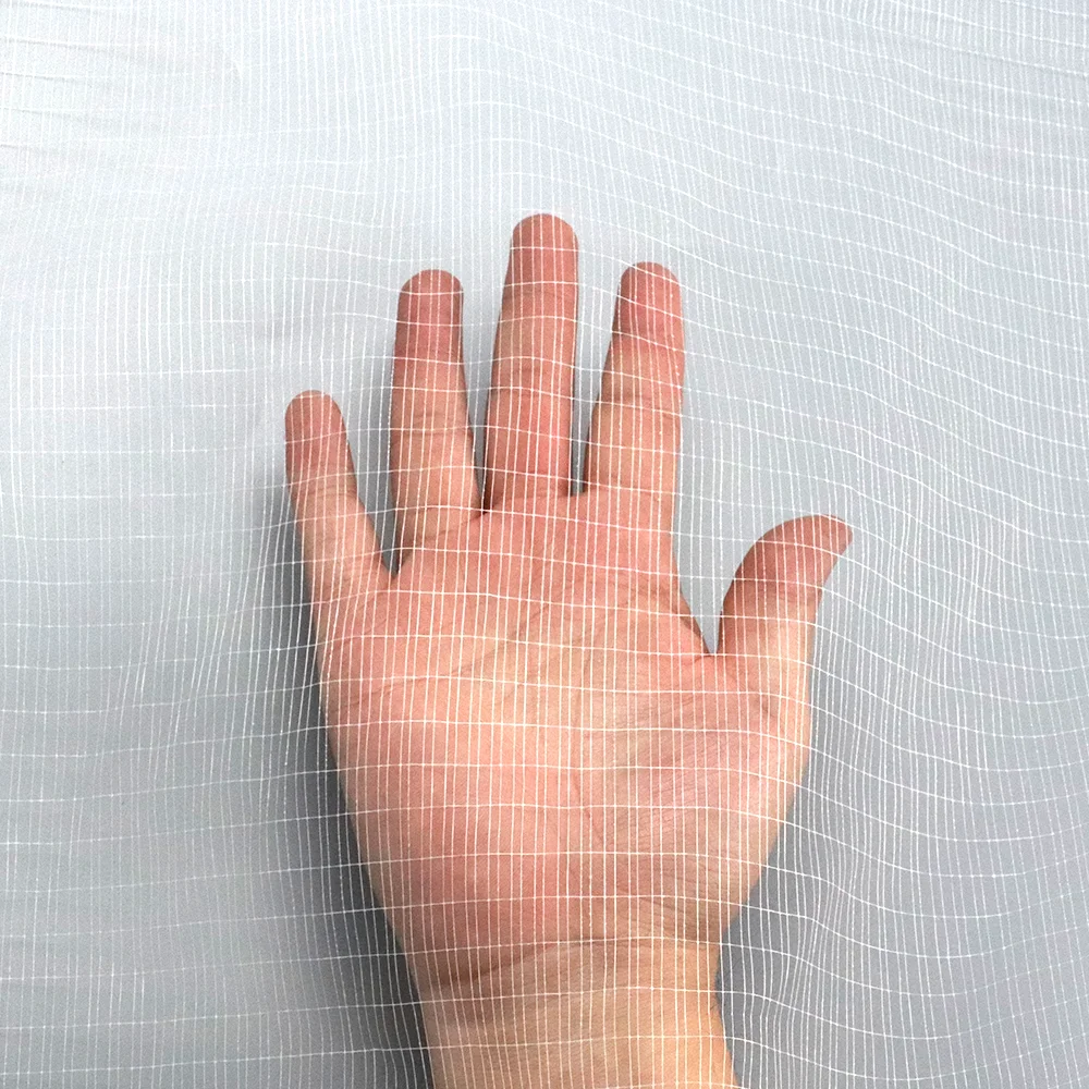 China Mesh Fabric Knitted Net Tape Polyester Laid Scrims Mesh For Adhesive Tape Backing