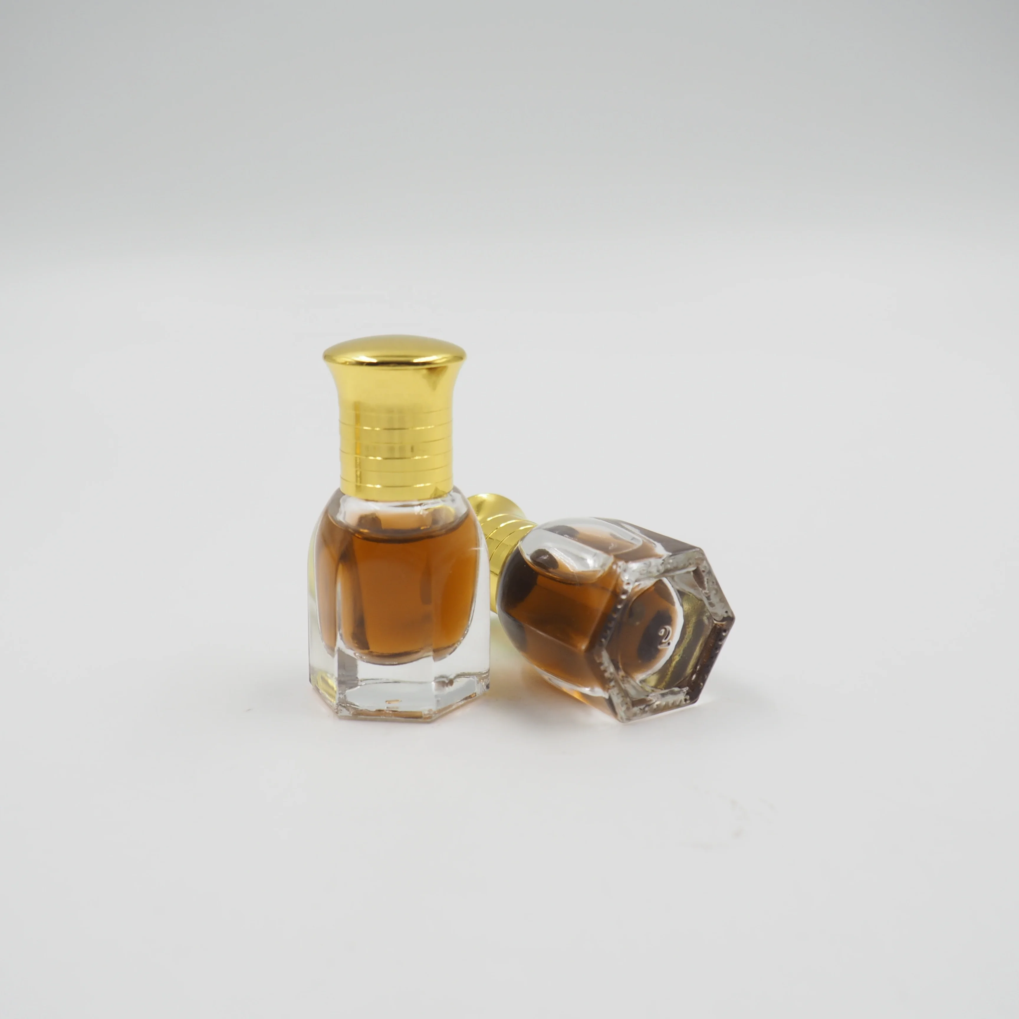 Wholesale 3ml 6ml 12ml Custom Logo Oud Oil Hexagon Fancy Attar Tola Glass Bottle for OUD Oil