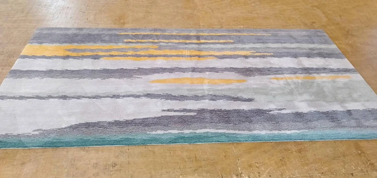 Hand tufted modern wool rugs can be used in living rooms and bedrooms.