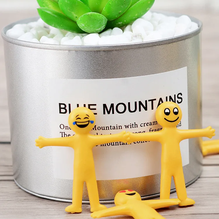 TPR Material Smiling Yellow mini man Stress Relive Non-toxic Plastic Capsule Toy Stretching Pull Toys for Kids Adults