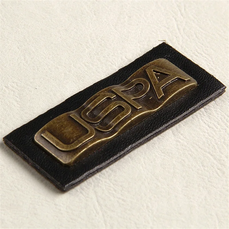 Custom jeans black leather patches with metal embossed logo labels for denim