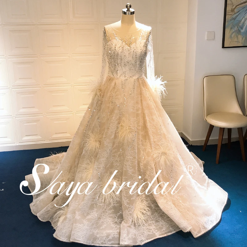 Lace Bridal Skirt with Long Sleeves and Long Tail Wedding Dress with feather