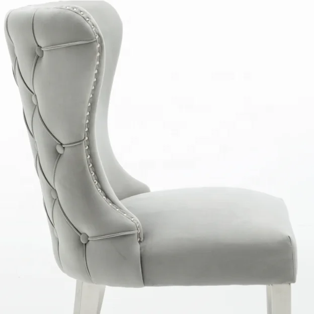 
Grey color back with buttons decoration studs around velvet fabric with stainless metal legs dining chair 