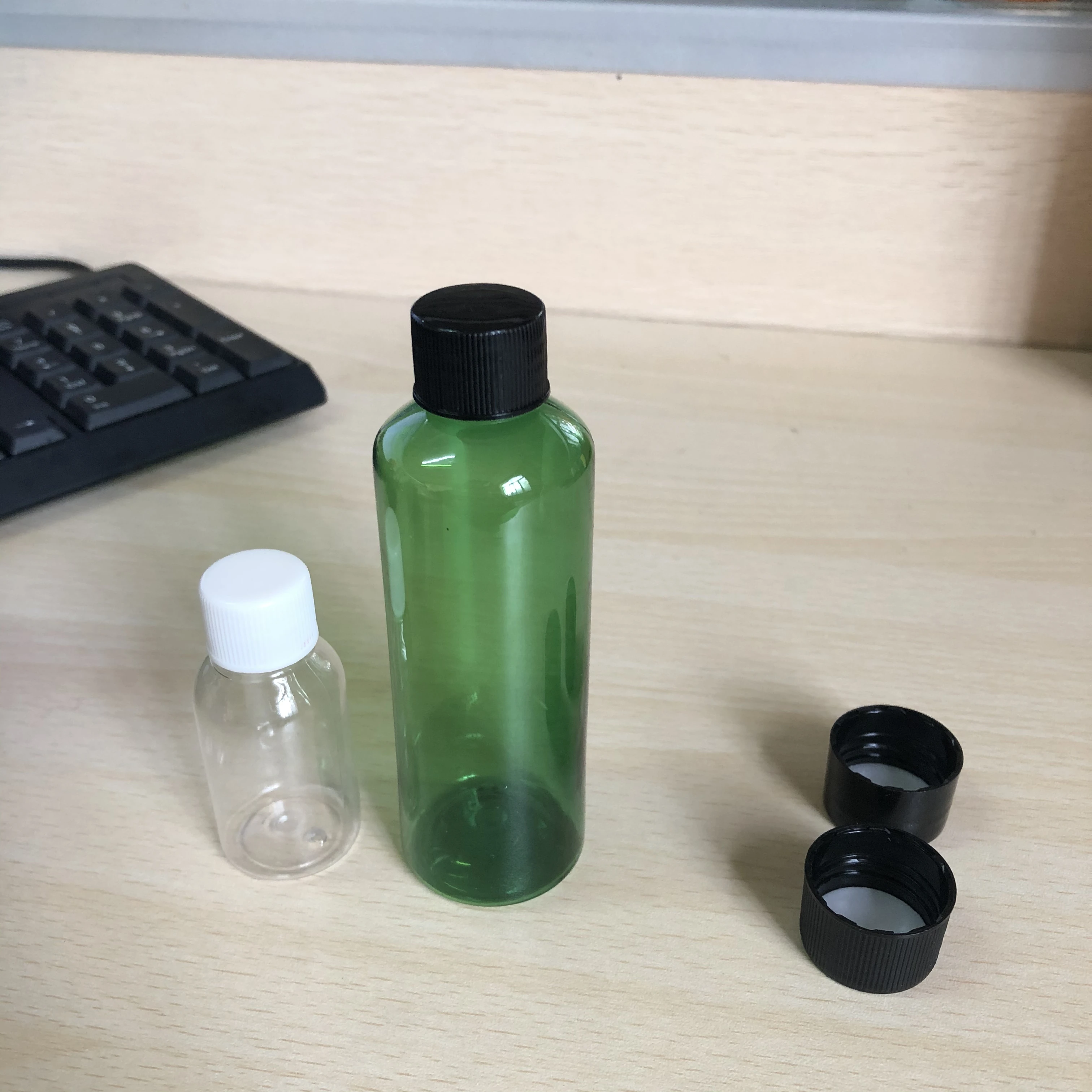 10ml 100ml Round PET Bottle With Black Screw Cap