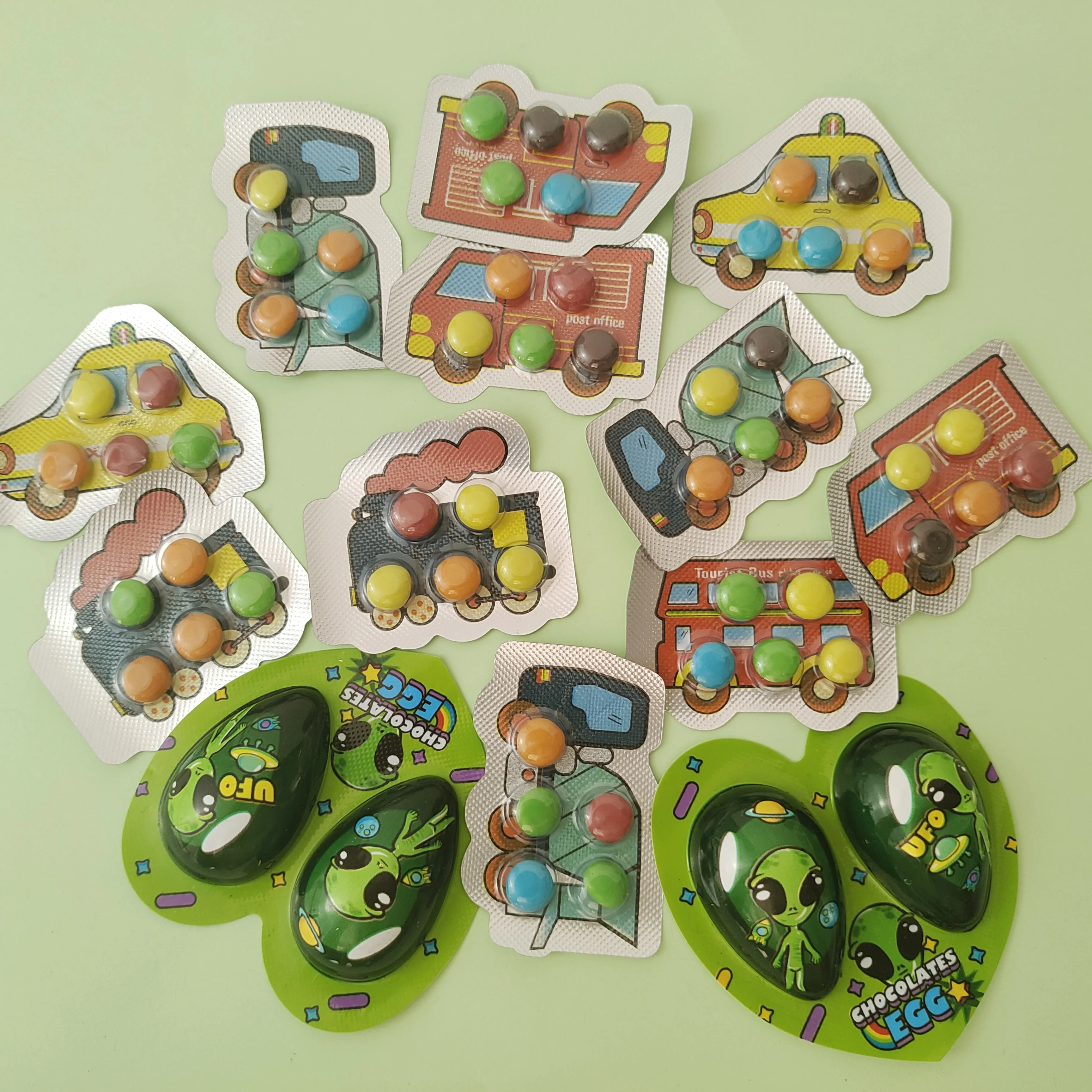 Hot sell wholesale cheap color car shape sweet chocolate beans Alien chocolate eggs heart-shaped chocolate
