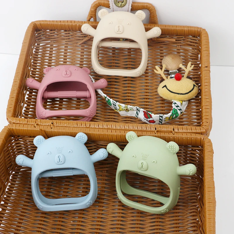 Cute cartoon attractive baby attention silicone grip glove soothing bear pig chick designs silicone teether toys
