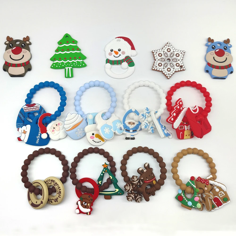 Factory Customized Christmas Tree Santa Socks Hat Snowman Sweater Silicone Teether Ring Space Silicone Baby Teether Gift Set
