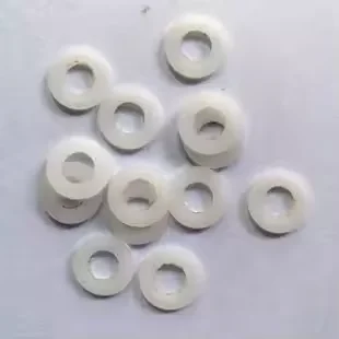 white nylon unthreaded spacer