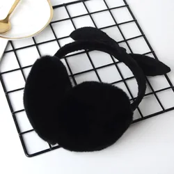 Korean version of the new cute rabbit ears bow hair ear earmuffs lady winter super warm warm earmuffs Rabbit ear modeling