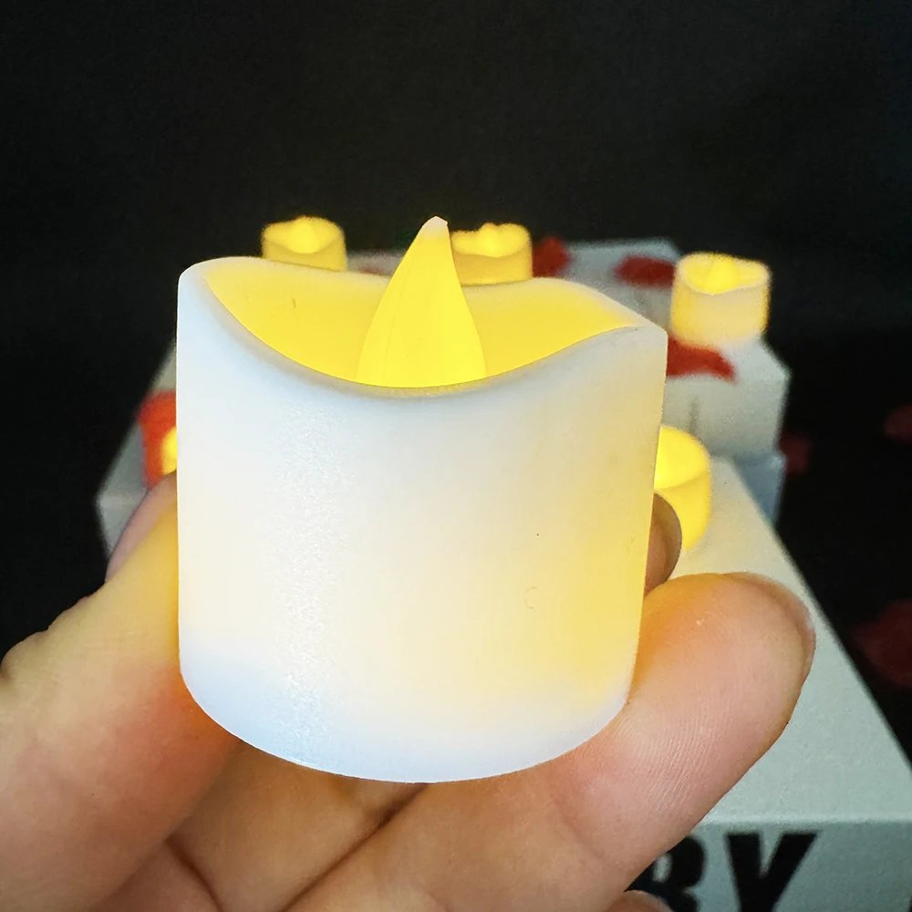 Wholesale home decor white battery operated  tea light candles LED flameless flickering tea lights candles 24-Pack