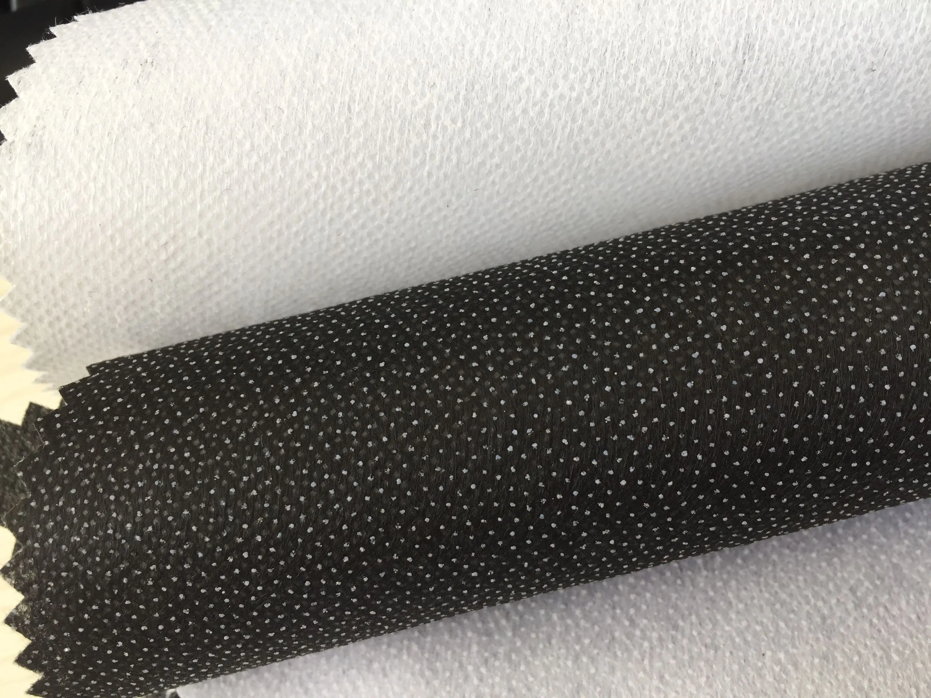 
100 Polyester reinforced stitch bond Interlining fusing brushed nonwoven buckram fabric 