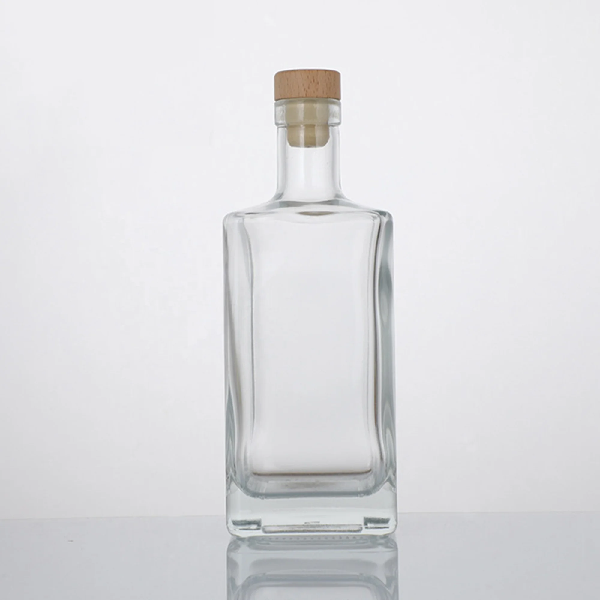 Custom factory 500ml 750ml spirit glass bottles Whiskey Vodka tequila gin glass bottles Wholesale cork caps